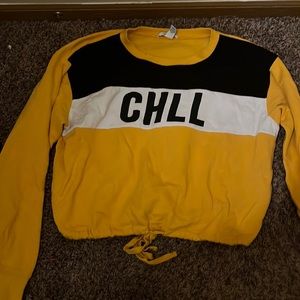Large, black, white, and yellow, crop top from Forever 21